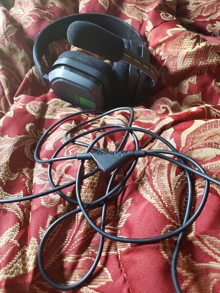 A cord plugged into a headset