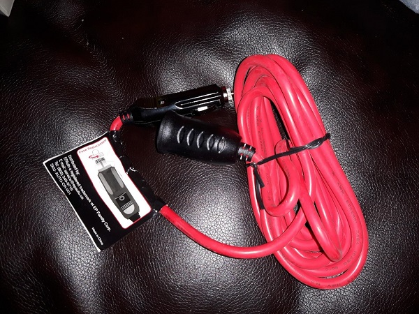 Red cable set on black leather