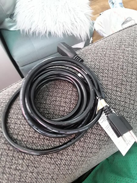 A coiled cable set on the edge of the cable