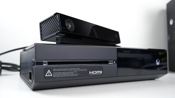 A close-up of an Xbox Kinect on top of a Xbox One