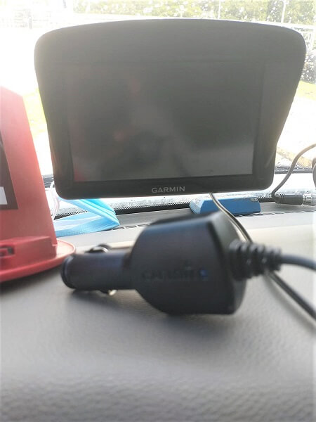 A GPS charger on the dashboard