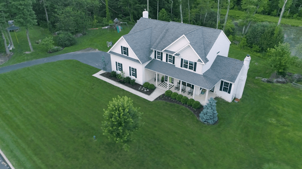 Birds eye view of a house with a big yard