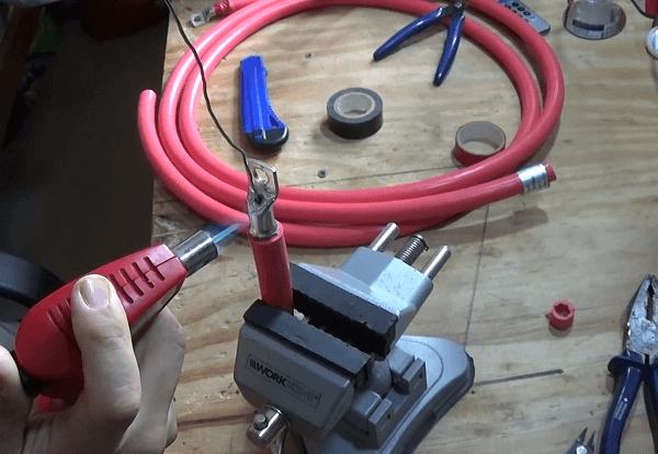 Somebody heating up a battery lug and melting soldering wire into it